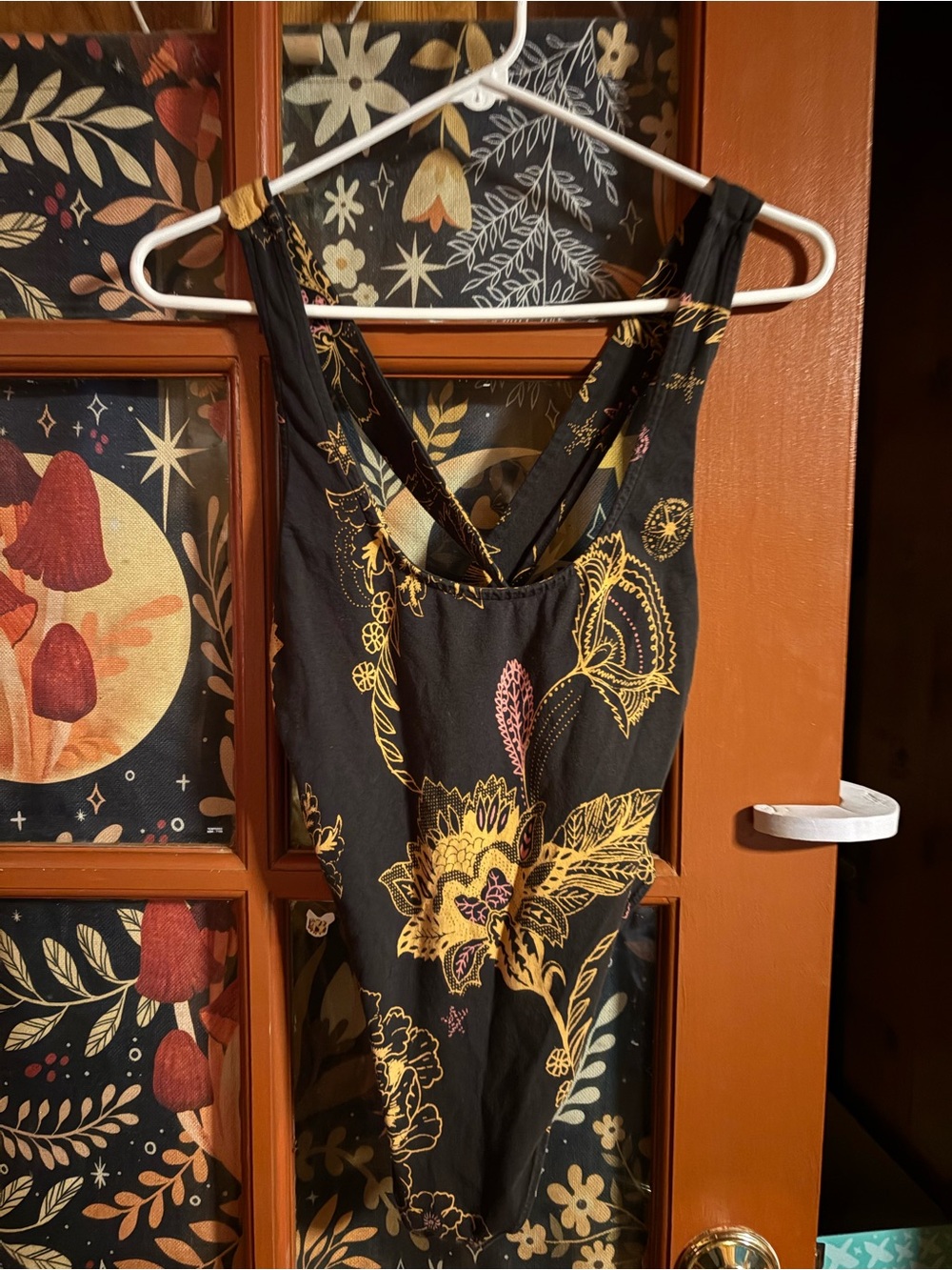 Black Floral One-Piece Swimsuit with Yellow Accent